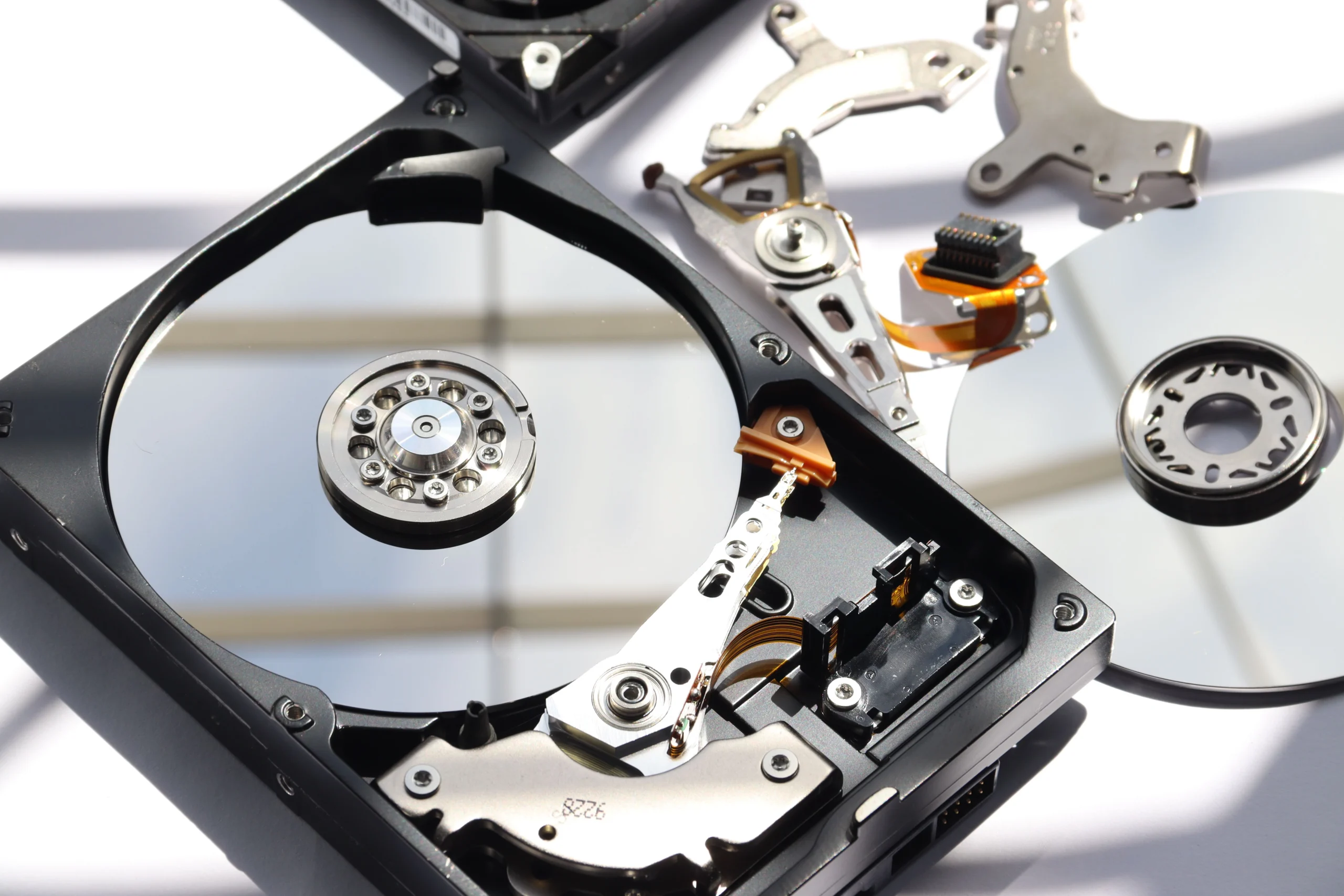 Technician performing data recovery on a hard drive